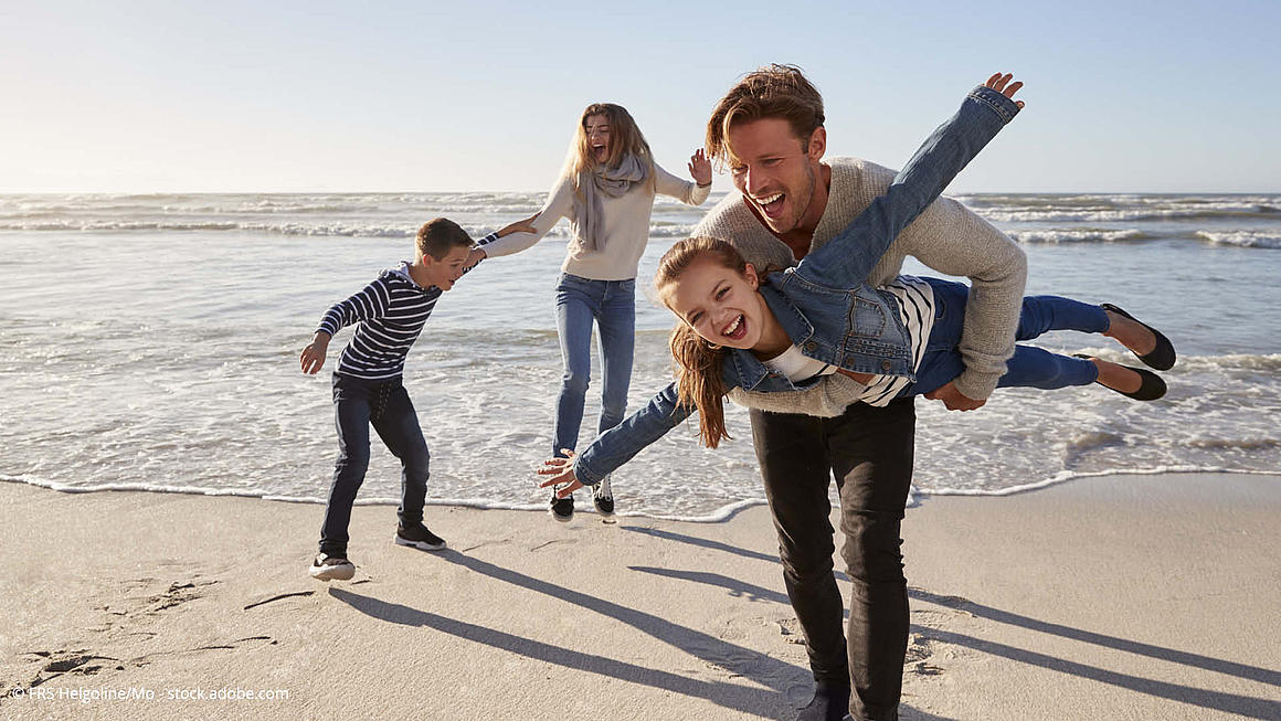 Family having fun at the beach of Heligoland